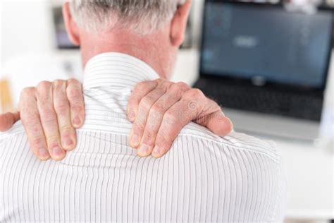 Businessman Suffering From Neck Pain Stock Image Image Of Workplace