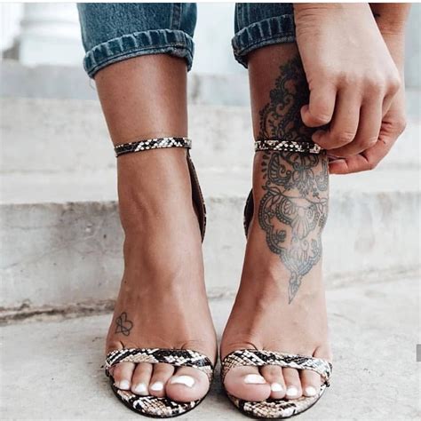 Wrap around ankle tattoos of this nature is a good classical style. Fashion ️Trends on Instagram: "Amazing via @real.shoes 🖤 📸 ...