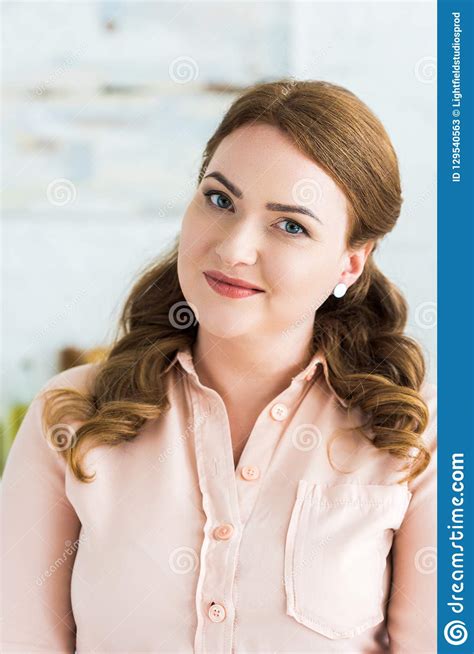 Portrait Of Beautiful Woman Standing And Looking At Camera Stock Image
