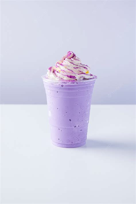 Premium Photo Milk And Purple Sweet Potato Frappe With Whipped Cream