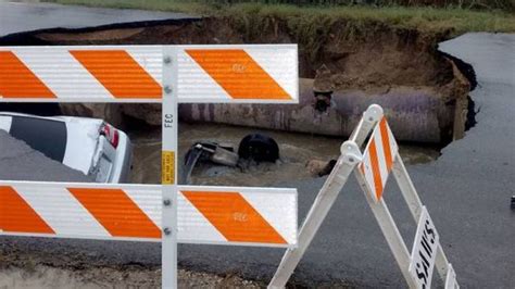 Massive Sinkhole Swallows Two Cars In Texas 13 Pics