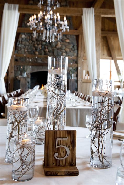 Floating Candle And Willow Branch Centerpieces Branch Centerpieces