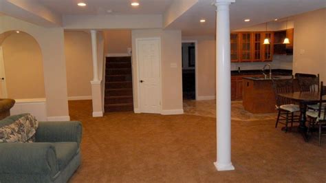 Tutorial showing the steps necessary to build a simple enclosure to cover and decorate a lally support column in a finished basement.structural support. Ideas For Basement Column Covers — The Wooden Houses Design