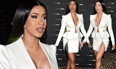 Cardi B Shows Off The Results Of Her Boob Job As She Puts On An Eye Popping Display In White