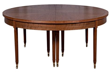 Home designing may earn commissions for purchases made through the links on our website. Viceroy's Expanding Table by LUTYENS FURNITURE & LIGHTING ...