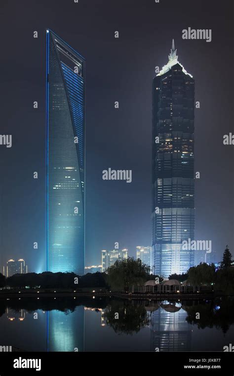 The Shanghai World Financial Center 492m And Jin Mao Tower 421m At