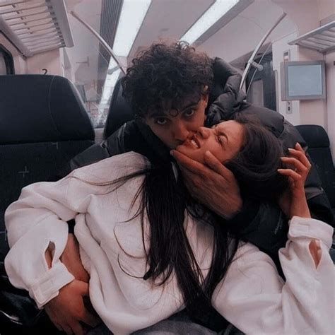 Download Cute Aesthetic Couple Kissing On Plane Picture