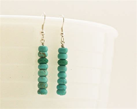 Dangle Earrings With A Stack Of Raw Turquoise And One Polished
