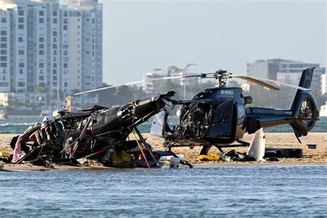 australia helicopter crash four dead after collision between two choppers near sea world on