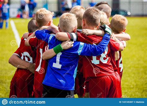 Young Children In Huddle Building Team Spirit Editorial Photography - Image of mental, kick ...