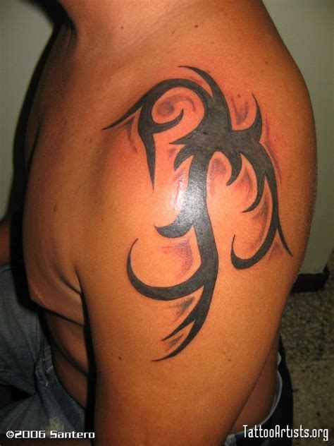 Cool Tribal Shoulder Tattoo For Men Tattoomagz › Tattoo Designs