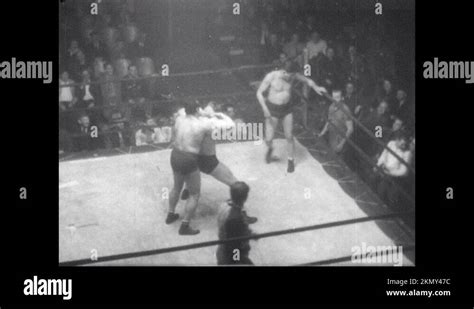 1940s Wrestler Slaps And Punches Opponents Wrestlers Punch And Brawl In Ring Stock Video