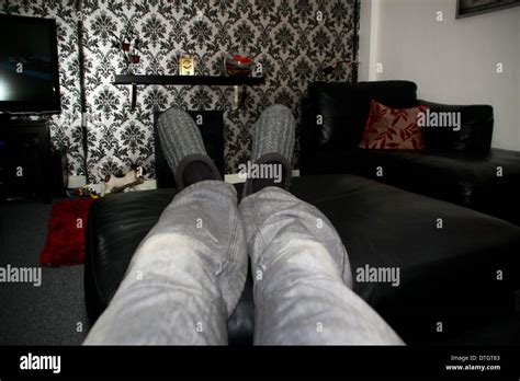 Feet On Footstool Hi Res Stock Photography And Images Alamy