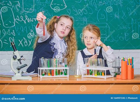 We Love Science School Children Performing Experiment In Science