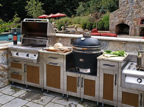Outdoor kitchen designer, dawn whyte of the lake street design studio in michigan stresses the importance of waterproof storage for satellite kitchens that must be nearly self. How to Build Outdoor Kitchen with Simple Designs ...
