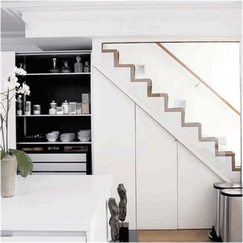 Ideas for under stairs storage by applying the shelves as a place of