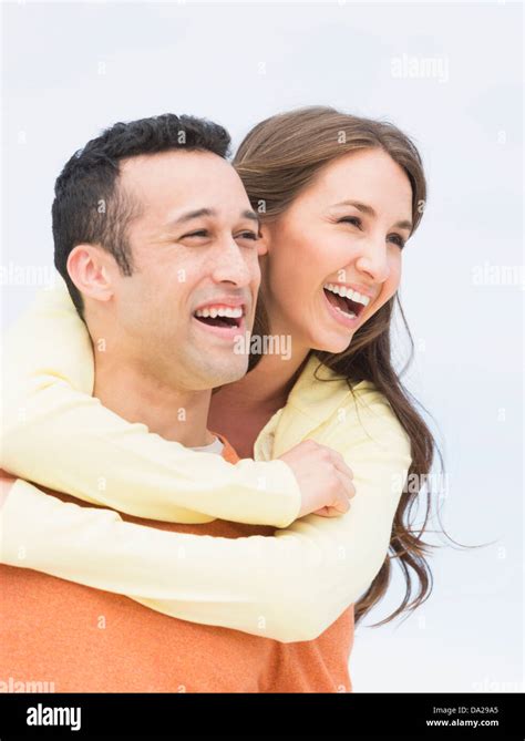 Happy Young Couple Embracing Stock Photo Alamy