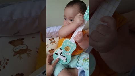 Baby Playing And Tune Guitar Youtube