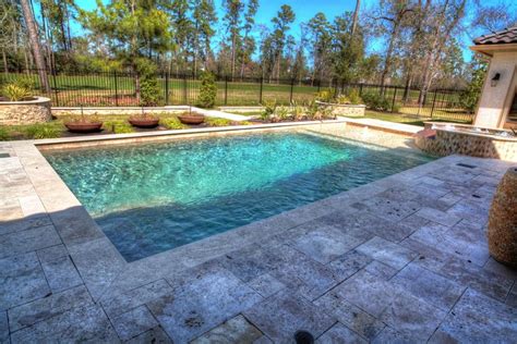 Maybe you would like to learn more about one of these? Rectangular pool with walkover water feature, fire pit ...