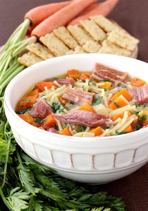 Stir in the ham and the frozen peas. Slow Cooker Ham Noodle Soup | A Leftover Ham Soup Recipe