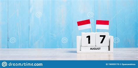 Wooden Calendar Of August 17th With Miniature Indonesia Flags
