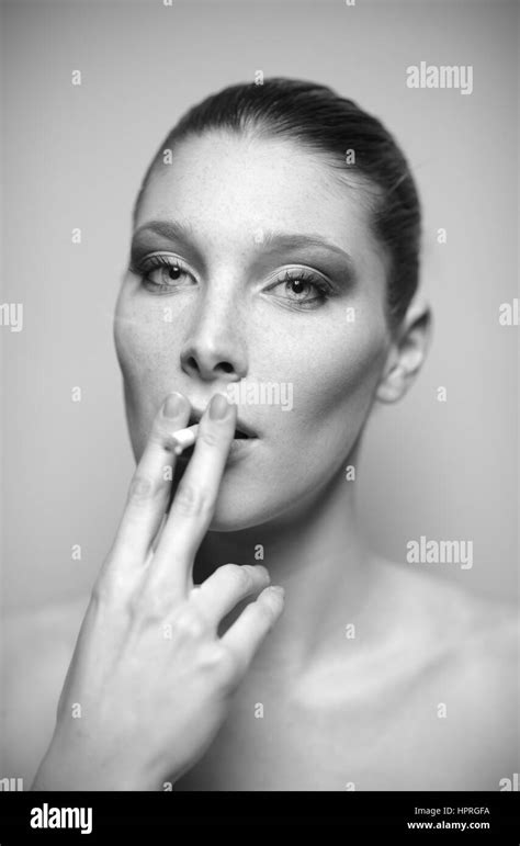 Portrait Of Beautiful Young Woman Smoking A Cigarette Stock Photo Alamy