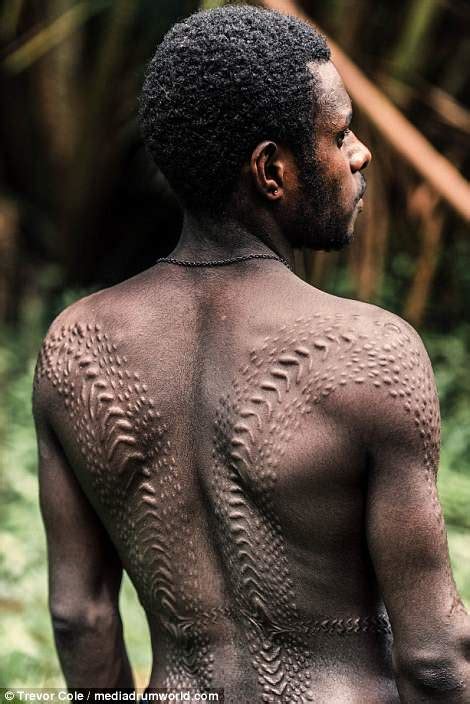 Kangunaman Tribesmen Scar Backs To Represent Their Crocodile Spirit