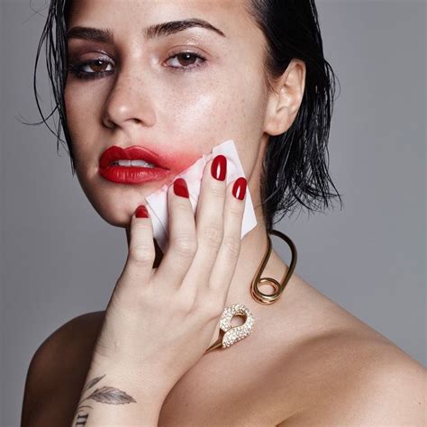 Demi Lovato Wears A Bold Red Lipstick With A Matching Manicure For
