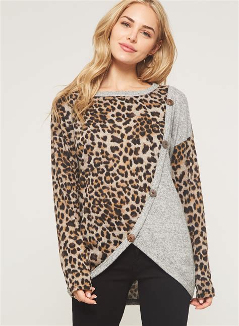 DT2659 A leopard print brush knit top featuring round neckline, dropped ...