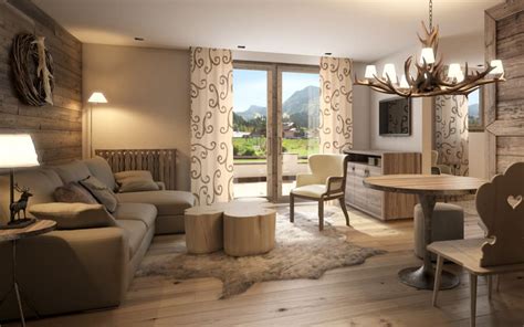 Gemütliches wohnzimmer mit grauen wänden. Hotel arlberg jagdhaus: wohnzimmer von go interiors gmbh ...