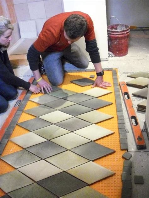 Laying bathroom tiles is not as easy as it might seem. How to Create an Inlaid Tile Rug | how-tos | DIY