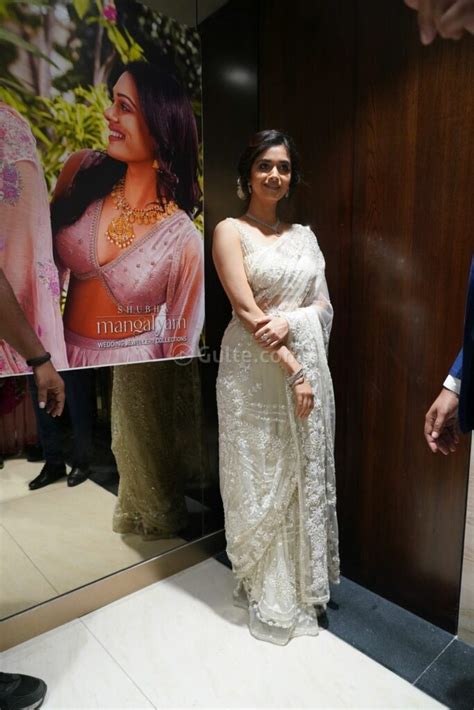 Keerthy Suresh Inaugurates A Jewellery Shop In An Ivory Sheer Saree