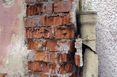 Damaged Brick Wall Stock Photo
