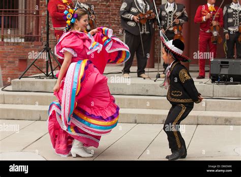 Mexican Mariachi Dancers And Singers Performing In Centennial Square At