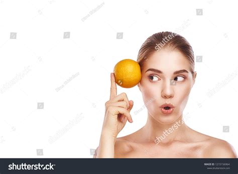 Beautiful Womans Face Orange Close Studio Stock Photo Edit Now 1215156964