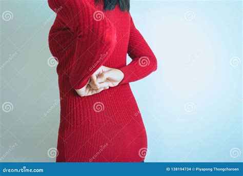 Woman With Lower Back Painfemale Suffering From Backache On White