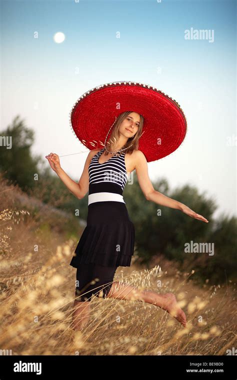 Young Girl With A Sombrero In The Early Evening Stock Photo Alamy