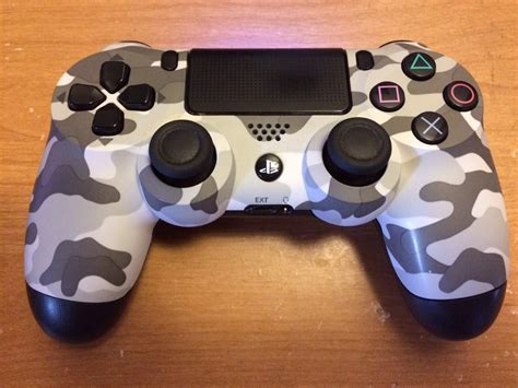 Now take it apart and throw some paint (or anything else you see fit) on there! DIY PS4 Scuf Controller Mod - Dishers.com