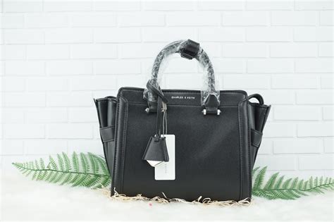 43 results for charles keith bag. CHARLES & KEITH BOXY TRAPEZE BAG