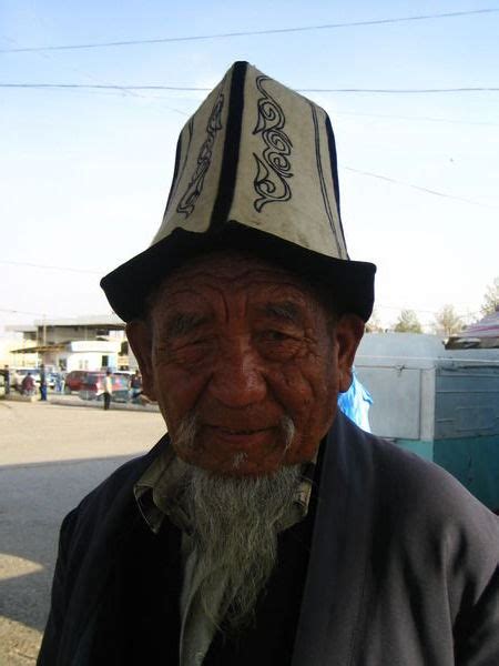 Bazaar Korgon Man With The Traditional Kyrgyz Hat Photo