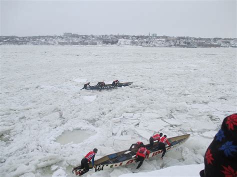 Racing Canoes On Ice Covered St Lawrence River Among Events At Quebec