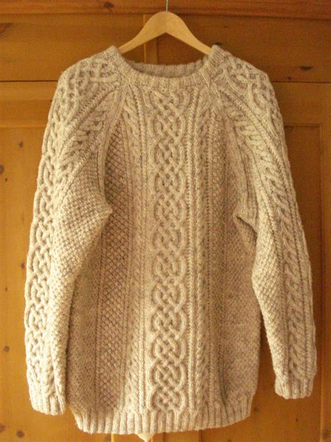 So, if you feel like knitting your own chunky cardigan, you'll find my free cardigan pattern at the end of this blog post. Handmade Aran sweater....wish my Nan would have taught me ...