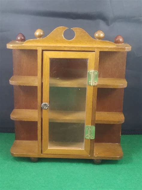 Browse our wide selection of curio and display cabinets to add a decorative touch to your home. Vintage Mini Curio Cabinet With Wall Hangers For Mini in ...