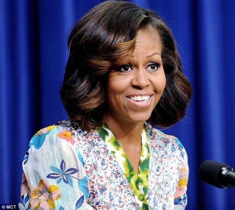 Michelle Obama Debuts New Haircut With Face Framing Caramel Highlights