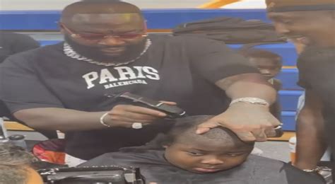 Rick Ross Goes Viral For Cutting Boy S Hair In Miami