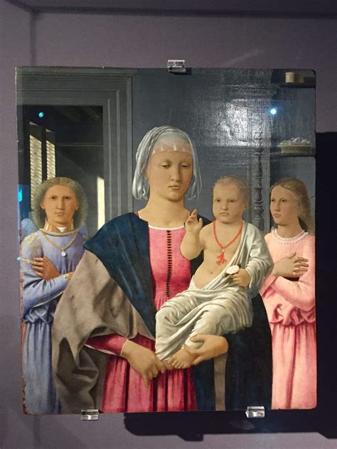 Piero Della Francesca Madonna And Child With Saints