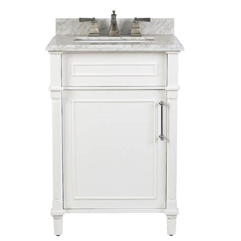 For bathrooms really limited on space, we carry a variety of corner bathroom vanities to choose from. Home Decorators Collection Aberdeen 24-inch White Single Sink Vanity with Carrara Marble T ...
