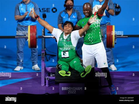 nigeria s alice oluwafemiayo with her gold medal celebrates her world record during the women s