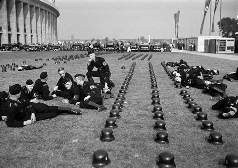Deutschland fährt zu den olympischen spielen. German SS troops relaxing at the 1936 Olympic Games in Berlin