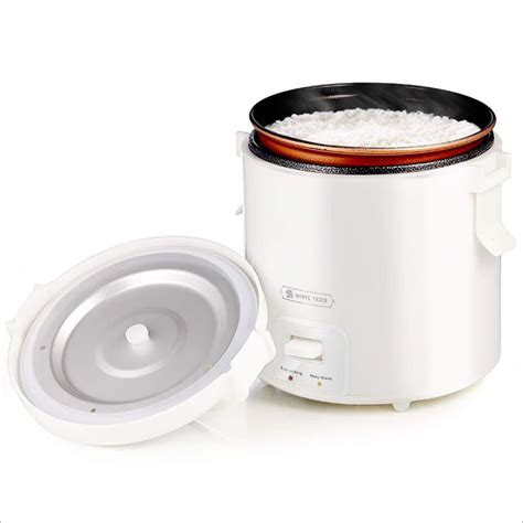 Rice is more likely to stick to a cooker with a scratched surface, whether or not it originally had a nonstick coating. 1.0L Mini Rice Cooker,WHITE TIGER Portable Travel Steamer ...